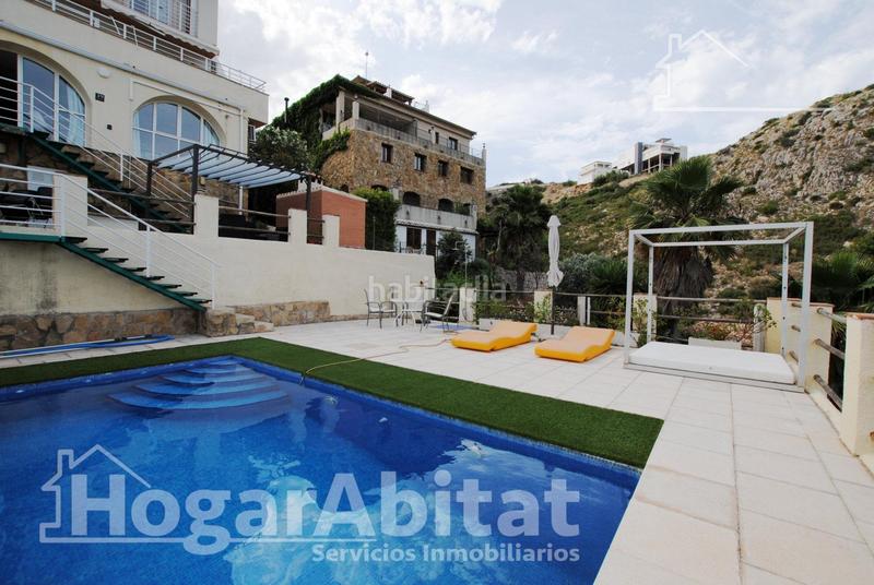 Foto 62a60743-1f70-4c96-a48f-938c6a9b446f. Chalet  con piscina, garaje, terraza y barbacoa en Gandia