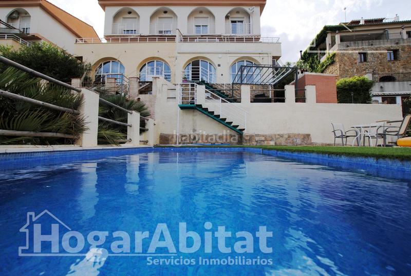 Foto 7bf65933-7c73-4ef2-84fe-1224eedd4a31. Chalet  con piscina, garaje, terraza y barbacoa en Gandia