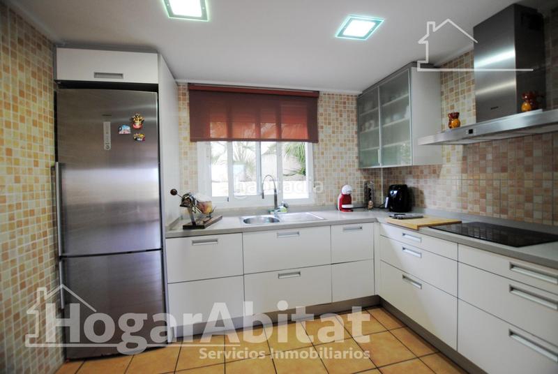 Foto 87e0f5c2-55c3-4928-b774-74eeca8fcbf3. Chalet  con piscina, garaje, terraza y barbacoa en Gandia