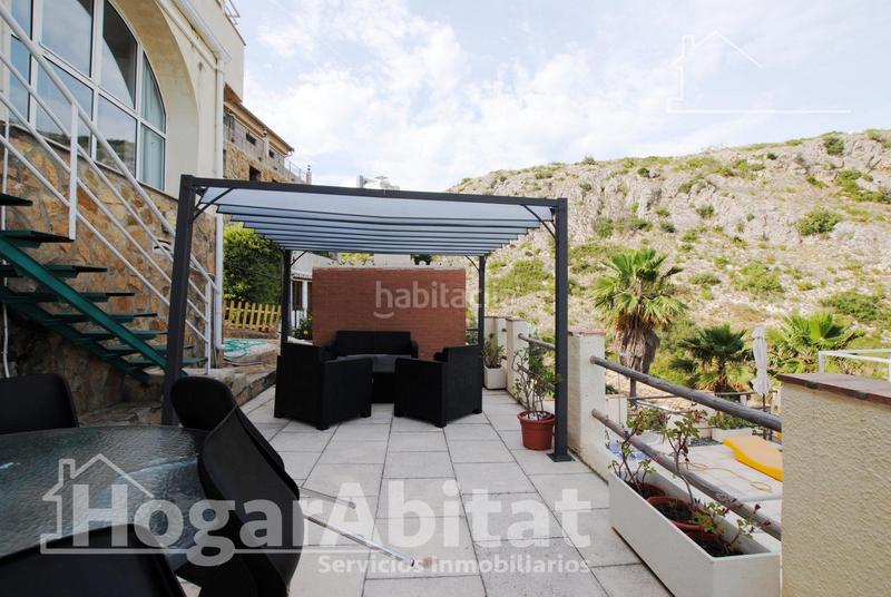 Foto 9c623b82-a538-46f7-a938-91d1e3eb8139. Chalet  con piscina, garaje, terraza y barbacoa en Gandia