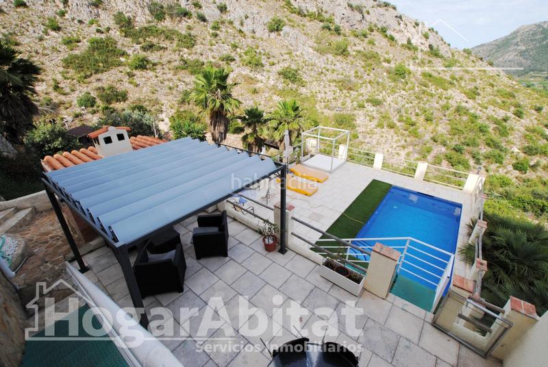 Foto b05af29b-e5b5-4959-8bb2-24968e219b30. Chalet  con piscina, garaje, terraza y barbacoa en Gandia