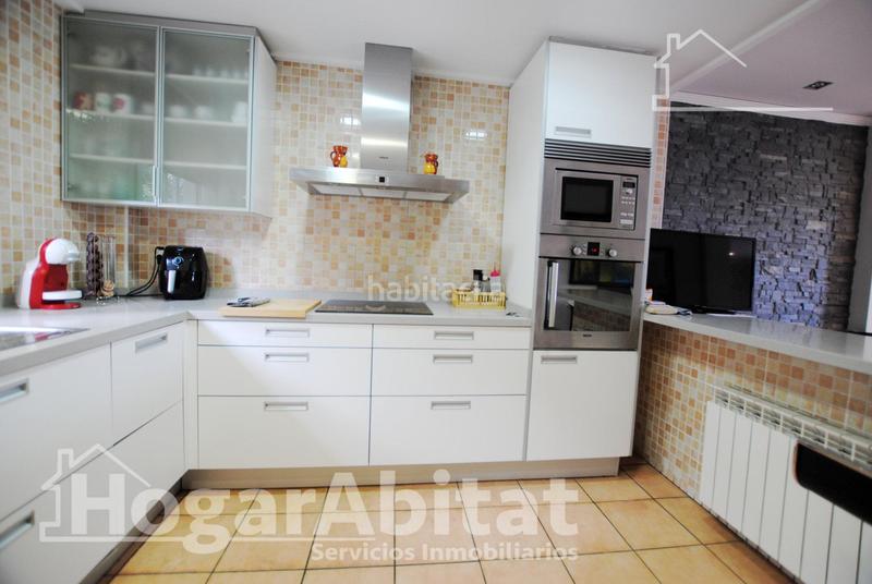 Foto c8eea0e1-f9f2-43dd-9368-2185ad43419f. Chalet  con piscina, garaje, terraza y barbacoa en Gandia