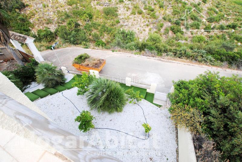 Foto d796a2ea-53a5-4eb1-925d-d24ccfb71d16. Chalet  con piscina, garaje, terraza y barbacoa en Gandia