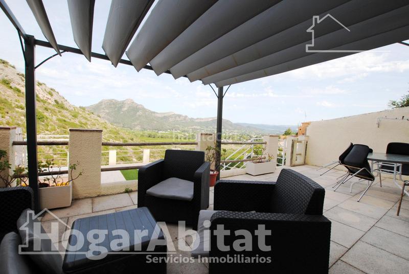 Foto d82dc7ba-cb0b-44d4-b188-658ba970e1de. Chalet  con piscina, garaje, terraza y barbacoa en Gandia