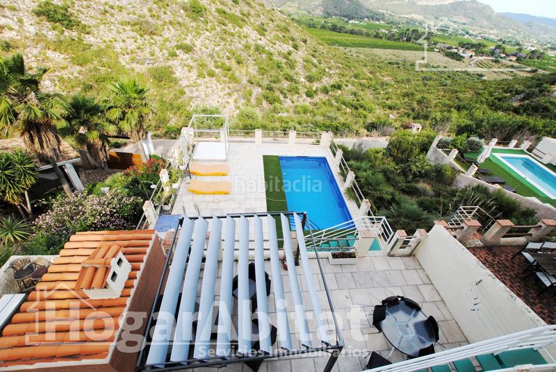 Foto dc7d464c-9d21-4bde-b5aa-cf4d9a7a294e. Chalet  con piscina, garaje, terraza y barbacoa en Gandia