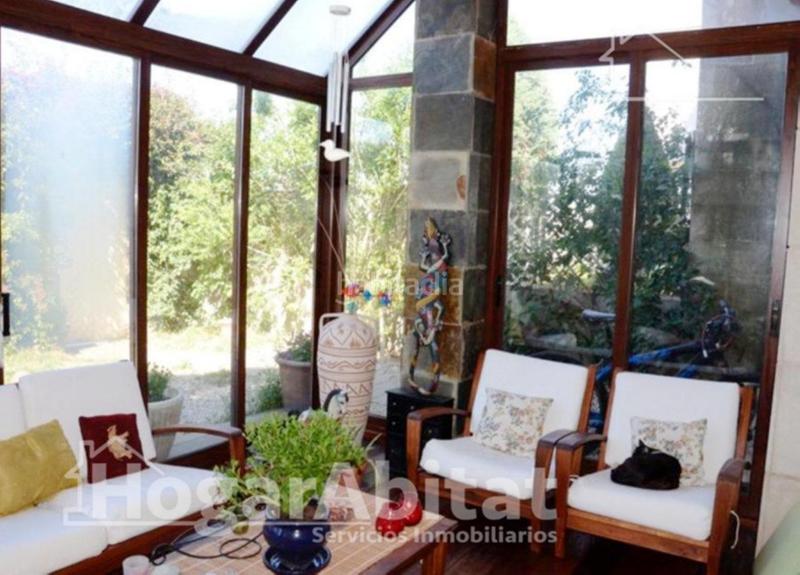 Foto 1f05baac-67a9-4d71-8f41-0f75ba33c06f. Chalet precioso chalet reformado con terraza, garaje y jardín en Algemesí