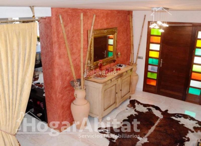 Foto d59de610-5e10-493f-a7b8-a568494de8a5. Chalet precioso chalet reformado con terraza, garaje y jardín en Algemesí