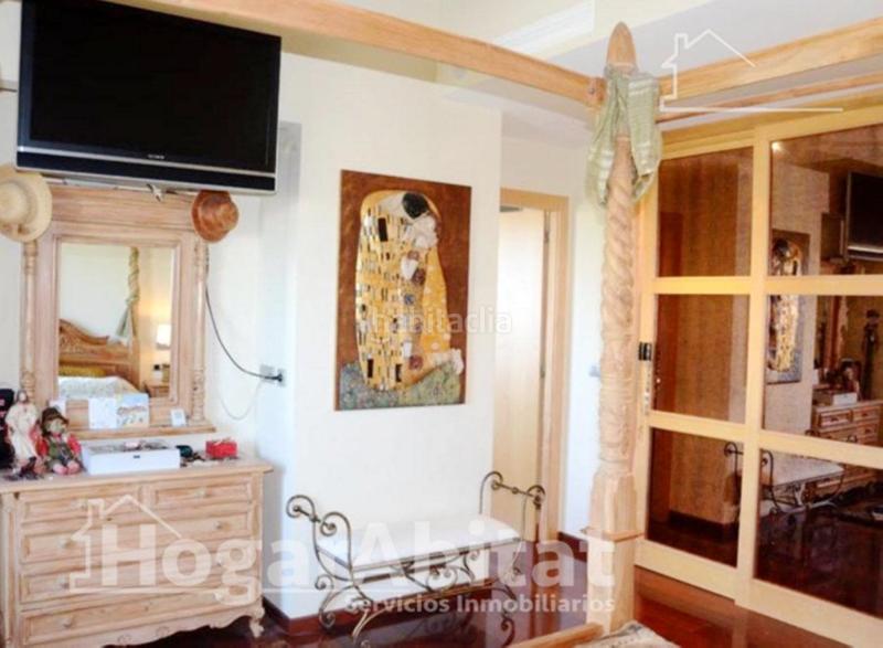 Foto e4992917-b4e6-4dbe-894b-cd364d1d4eac. Chalet precioso chalet reformado con terraza, garaje y jardín en Algemesí