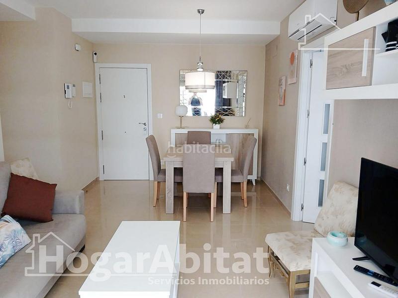 Foto d507902a-4289-46a1-b376-5b04580a1551. Piso totalmente nuevo! exterior en residencial con piscina y terraza junto a la playa en Cabanes