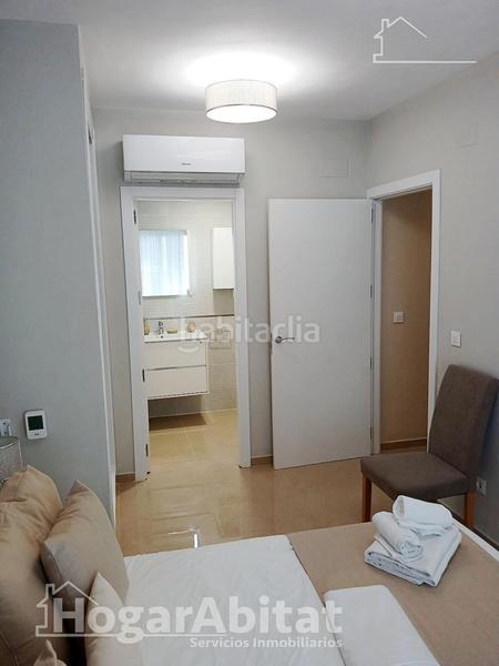 Foto e0e84b35-28f3-4540-9591-745d6d7b25c0. Piso totalmente nuevo! exterior en residencial con piscina y terraza junto a la playa en Cabanes