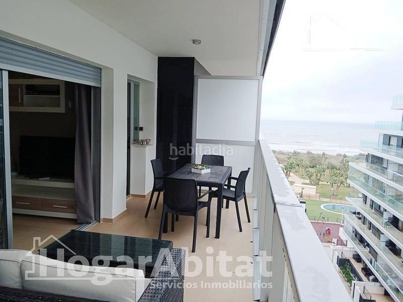 Foto f0b154e2-020a-41b4-a82b-2fe1dc04c4ec. Piso totalmente nuevo! exterior en residencial con piscina y terraza junto a la playa en Cabanes