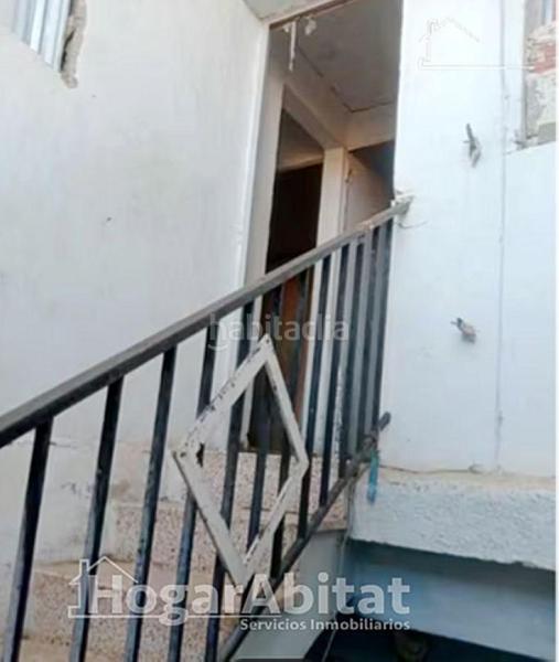 Foto 5b5e633c-6f8e-4ccd-9420-9a0279ef6bfe. Casa economico! casa con terraza y con muchas posiblidades en Alzira