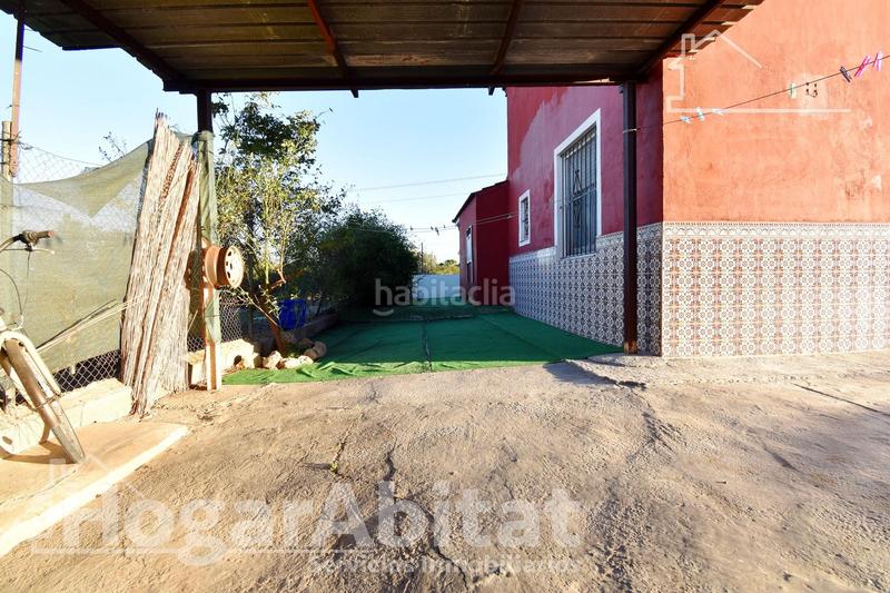 Foto 0f0d78a7-0e07-4b89-935a-3307667b6714. Chalet  con gran terreno, piscina, barbacoa y garaje en Gandia