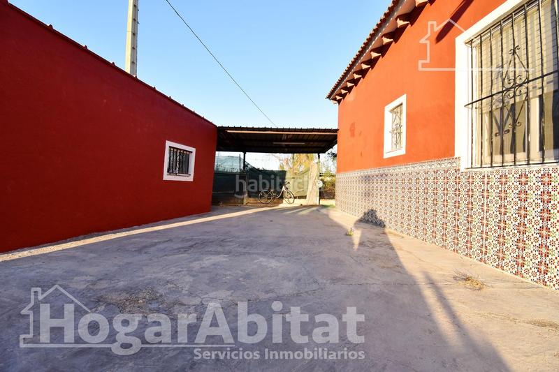 Foto 783bc787-3765-436d-b565-7666187d19e8. Chalet  con gran terreno, piscina, barbacoa y garaje en Gandia