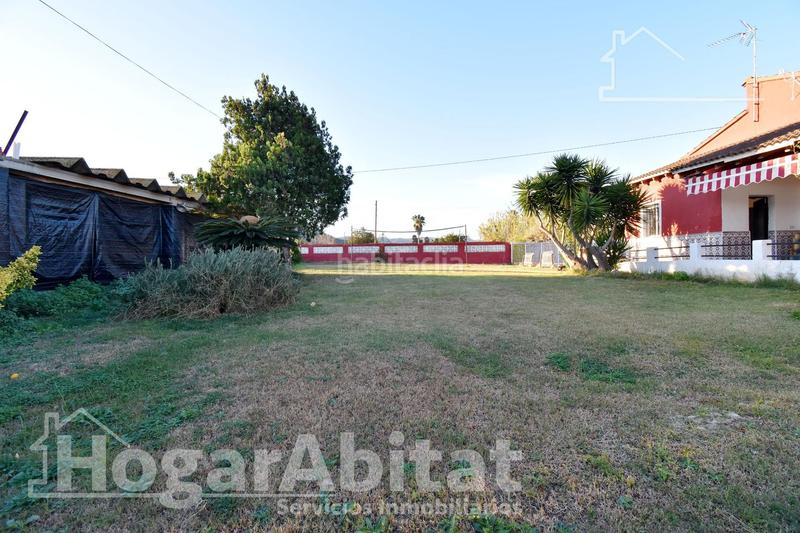 Foto 916bb553-21c2-4681-b2cf-5d3f6da8a552. Chalet  con gran terreno, piscina, barbacoa y garaje en Gandia