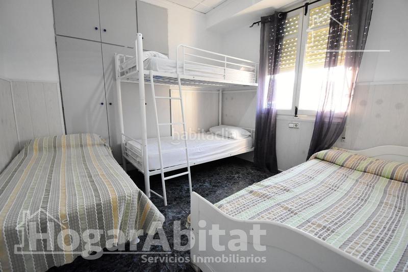 Foto c8c64c69-5a36-4c42-a4a5-c0b6a1d08e9d. Chalet  con gran terreno, piscina, barbacoa y garaje en Gandia