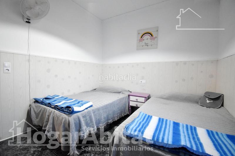 Foto fffd5a89-7b23-4bc1-a620-3983b045dba8. Chalet  con gran terreno, piscina, barbacoa y garaje en Gandia