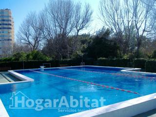Apartament a El Saler. Reformado en residencial con piscina en primera linea de playa