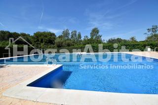 Apartament a El Saler. Reformado en residencial con piscina en primera linea de playa
