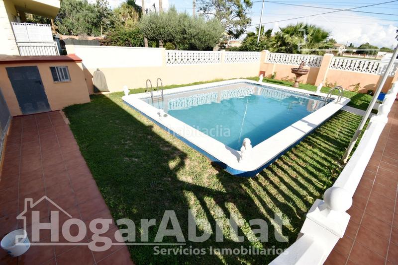 Foto 36f43f3d-cc5d-4707-aa18-ca2f8bb20852. Chalet con riscaldamento parcheggio piscina in El Grao Castellón de la Plana
