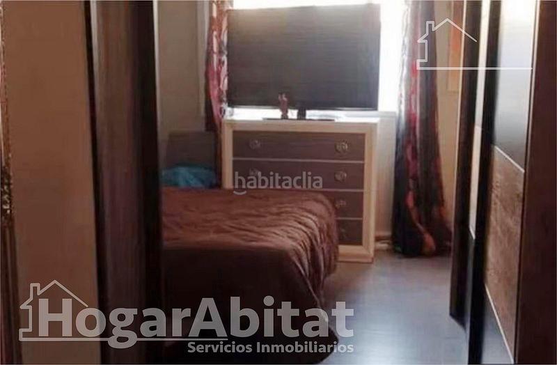 Foto 59336576-5010-434e-995c-e59a1c70fa34. Casa adossada amb calefacció aparcament a Polinyà de Xúquer