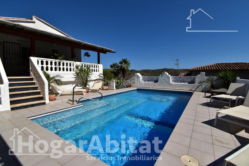 Foto 4c6ba5c5-75cb-42de-8f78-bd1a36e291b9. Chalet  totalmente reformado! amplio con 4 viviendas independientes y piscina privada en Gandia