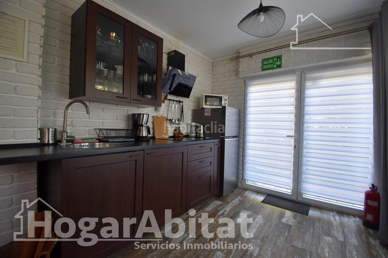Foto 5a16b73a-4326-4b57-888e-fe8c9d78aff5. Chalet  totalmente reformado! amplio con 4 viviendas independientes y piscina privada en Gandia