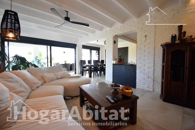 Foto cfba9f1d-9eb6-4611-9406-60f23c83bd15. Chalet  totalmente reformado! amplio con 4 viviendas independientes y piscina privada en Gandia