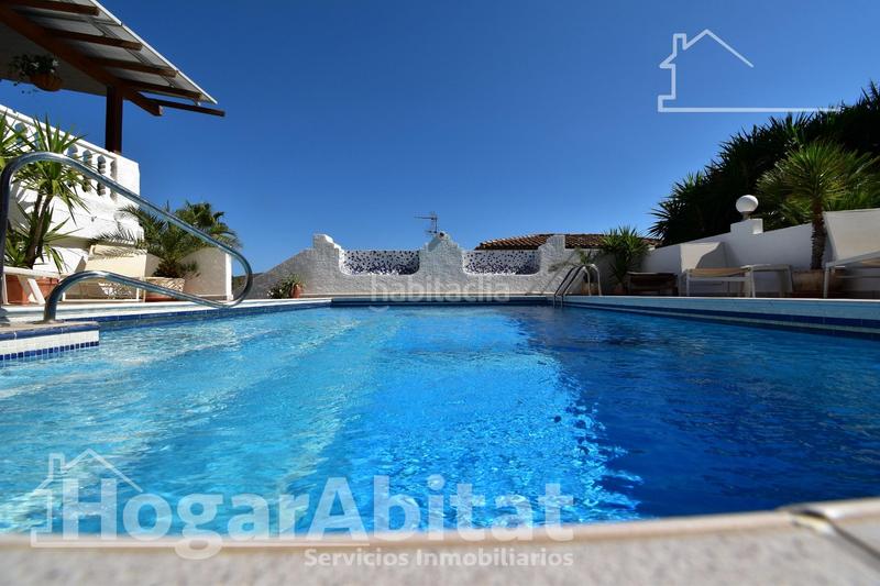 Foto 6c25a5f6-76b1-46fa-9d1b-134abe631685. Chalet con parcheggio piscina in Urbanizaciones Gandia