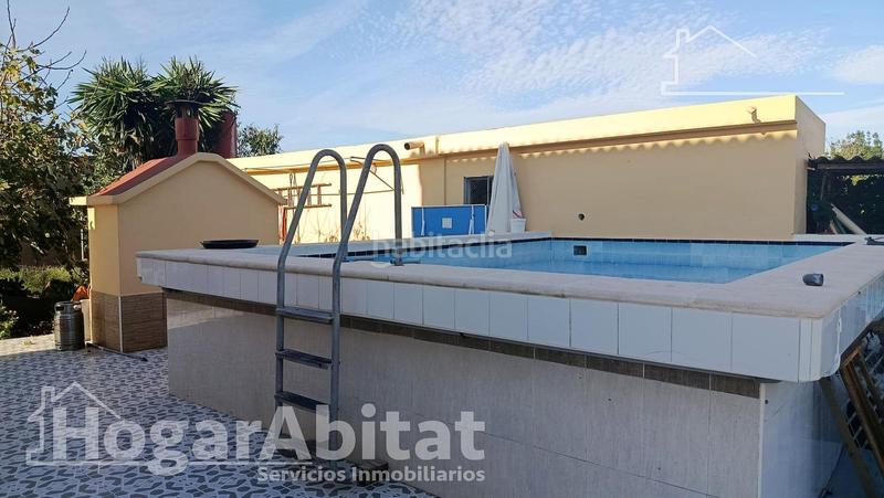 Foto 12e4a3fe-bee2-4341-8245-0d7e22e7ef1d. Xalet amb aparcament piscina a Oliva playa Oliva