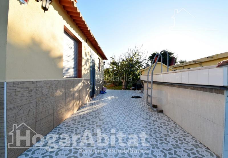 Foto 21b73dce-7e4a-41ec-b6e1-f4b3f2387d1e. Xalet amb aparcament piscina a Oliva playa Oliva