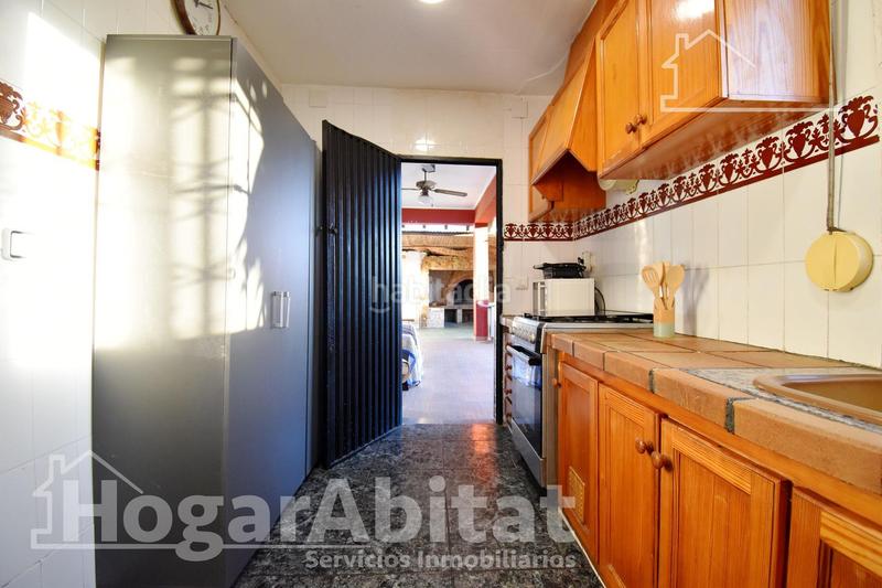 Foto 337fbf7d-4137-4b80-980c-a40ff71be5f5. Chalet  con gran terreno, piscina, barbacoa y garaje en Gandia