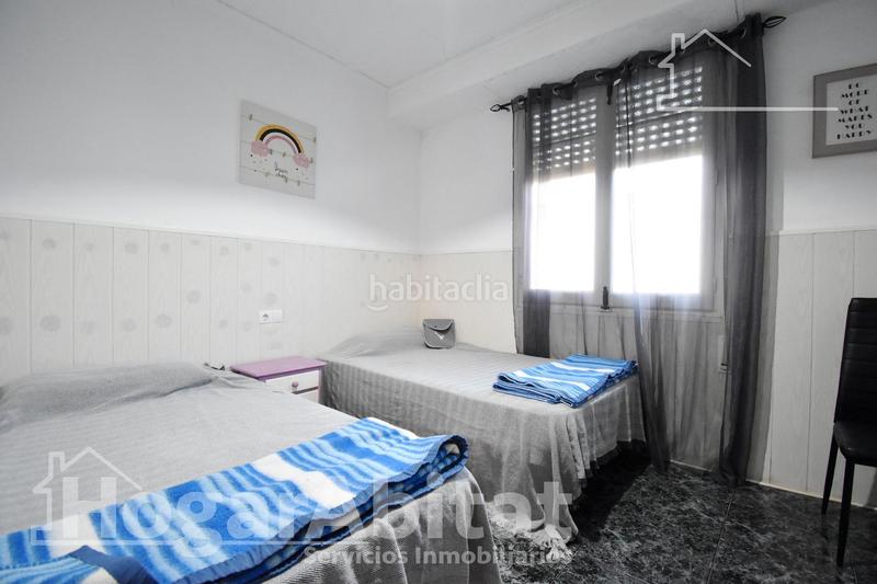 Foto 5285b7aa-11ad-44d4-a693-906d31e51d77. Chalet  con gran terreno, piscina, barbacoa y garaje en Gandia