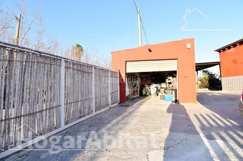 Foto 64a6de11-fcaf-46ba-8f61-9dfe151d966d. Chalet  con gran terreno, piscina, barbacoa y garaje en Gandia