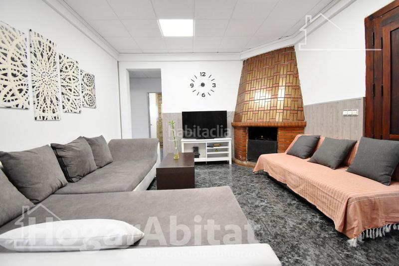 Foto 6854148f-1820-4445-b9c9-83f78fb9d2b1. Chalet  con gran terreno, piscina, barbacoa y garaje en Gandia