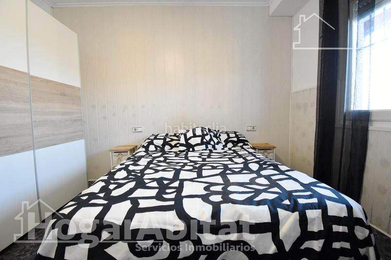 Foto 9cbbd0da-04dd-4931-8fff-4d81ba599c91. Chalet  con gran terreno, piscina, barbacoa y garaje en Gandia