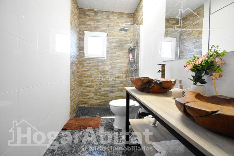 Foto a4d08a3f-054a-4c6f-9dd3-a6abcf24837b. Chalet  con gran terreno, piscina, barbacoa y garaje en Gandia