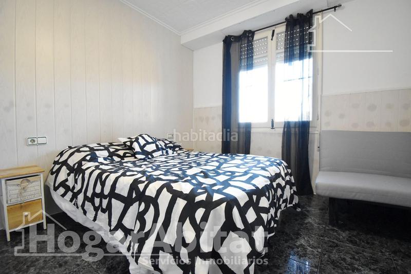 Foto e4a5957c-d1df-499f-b689-c055880e3e83. Chalet  con gran terreno, piscina, barbacoa y garaje en Gandia