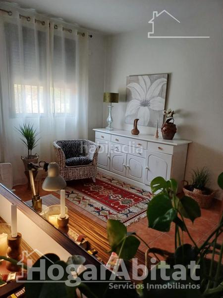 Foto 06067286-9326-4195-ba0a-cd0f10efcd6e. Chalet  seminuevo con terraza y garaje en Borriol