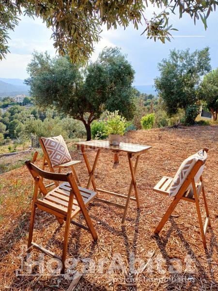 Foto 083a0160-e54c-4bfe-a7a6-9fa8ea1600cb. Chalet  seminuevo con terraza y garaje en Borriol