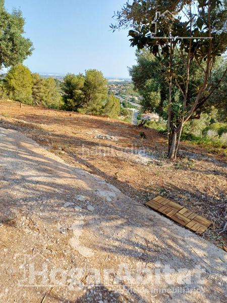 Foto f381bec0-ca48-44f0-861c-640501d1504b. Chalet  seminuevo con terraza y garaje en Borriol