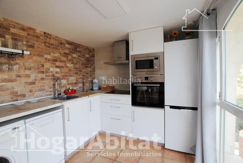 Foto 13916970-23cb-47cd-ad81-9f92be73b057. Chalet  con piscina, garaje, terraza y barbacoa en Gandia