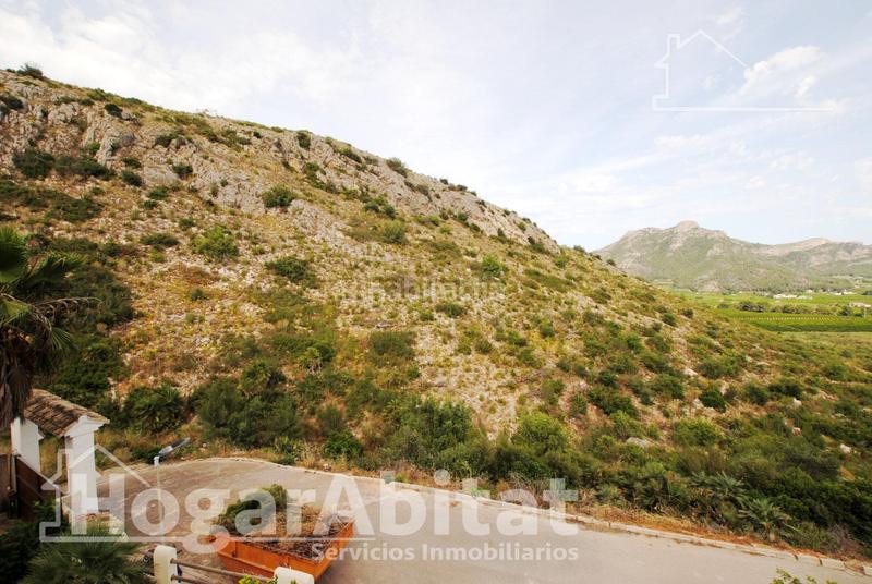 Foto 47b8a412-9995-408f-944b-76406c15fdd7. Chalet  con piscina, garaje, terraza y barbacoa en Gandia