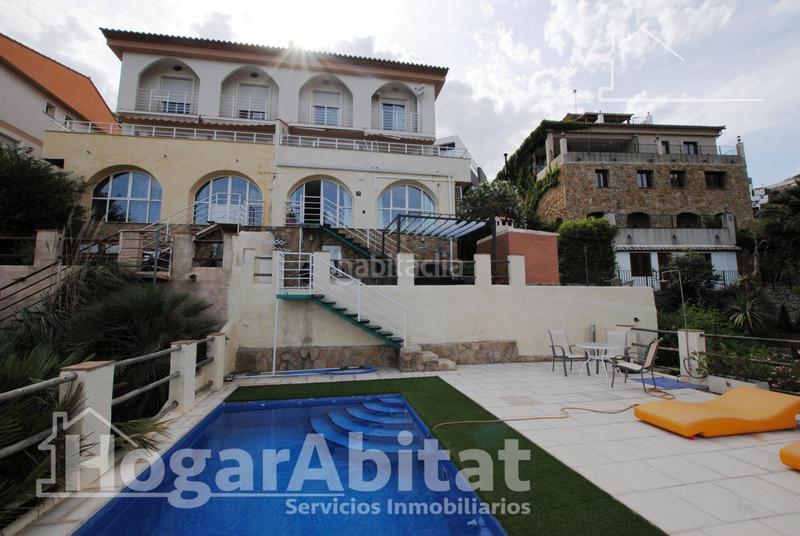 Foto a23126d3-d600-4a88-9575-22ed073db606. Chalet  con piscina, garaje, terraza y barbacoa en Gandia