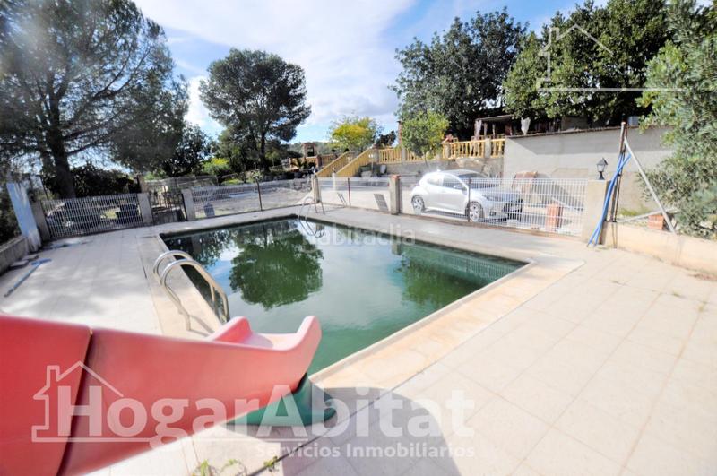 Foto 841daf77-f9f5-4646-acbf-17aca1f16e29. Chalet con parcheggio piscina in Godelleta