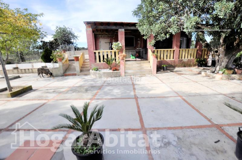 Foto d69cc2f4-cc44-40b7-b1aa-4256b16acc9e. Chalet con parcheggio piscina in Godelleta