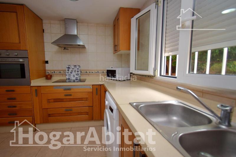 Foto 5e06f2c4-837b-4706-92b4-54230dab79ca. Chalet  reformado con piscina, garaje, terraza y barbacoa en Llíria