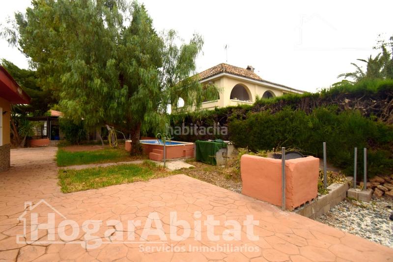 Foto 6cee5aef-705e-4b73-8c53-619e05c62689. Chalet  reformado con piscina, garaje, terraza y barbacoa en Llíria