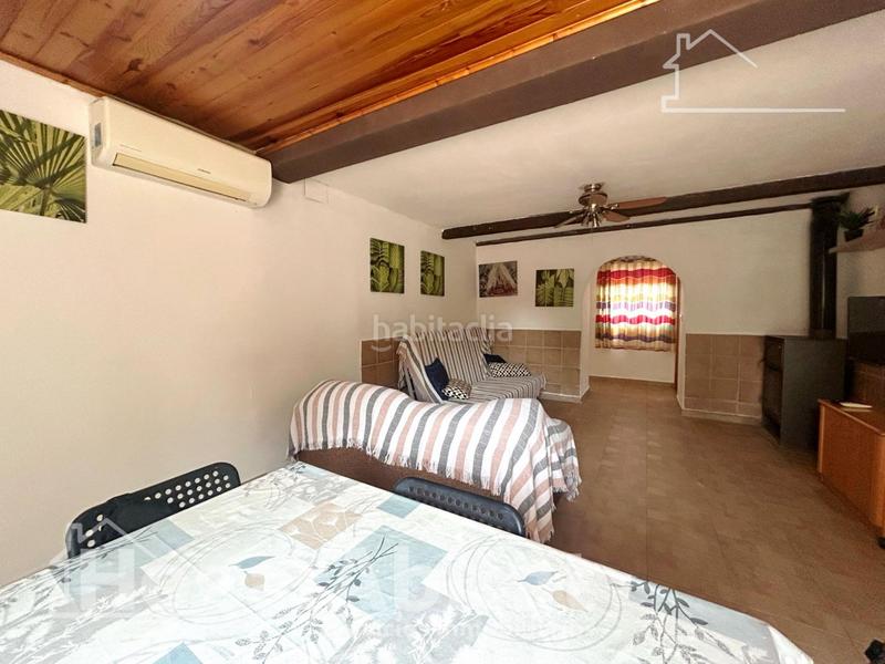 Foto 7752066a-787f-4c67-9b8f-7ed72be1ee6e. Chalet  reformado con piscina, garaje, terraza y barbacoa en Llíria