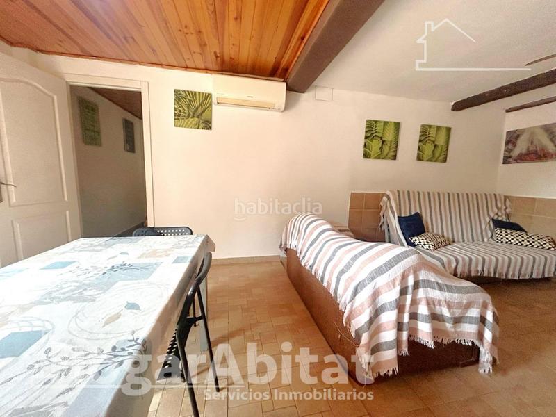 Foto 7ee85339-305a-4a8f-9146-96c8a129a2ce. Chalet  reformado con piscina, garaje, terraza y barbacoa en Llíria
